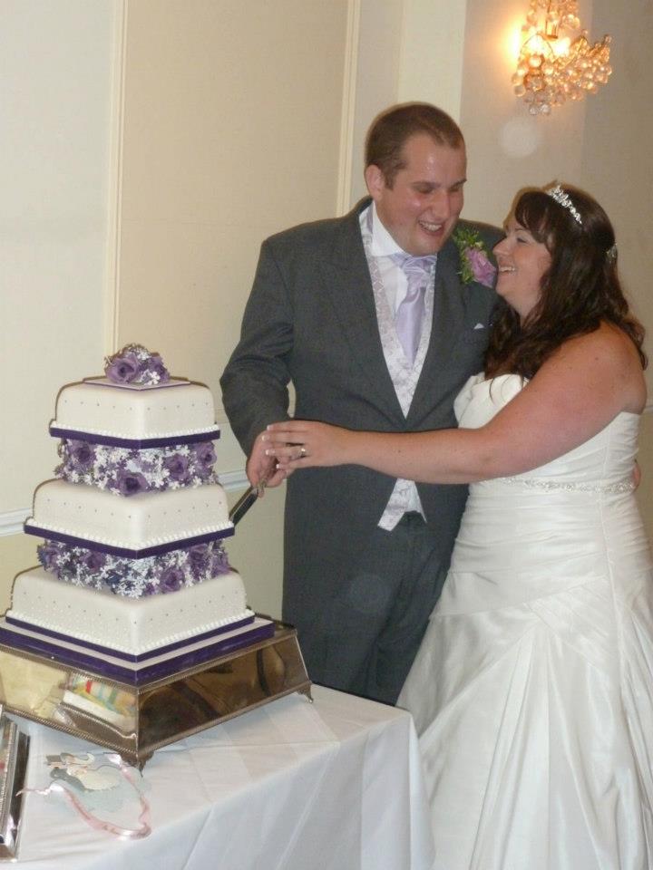 Steve and Rebecca cutting the cake